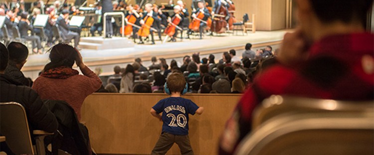 A young boy watches a relaxed performance at the TSO. Photo credit: Jag Gundu.